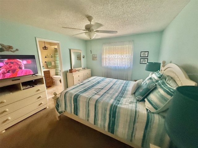 1814 Driftwood Cir S, Oldsmar, FL 34677 - carpeted bedroom featuring a textured ceiling, ensuite bathroom, and ceiling fan