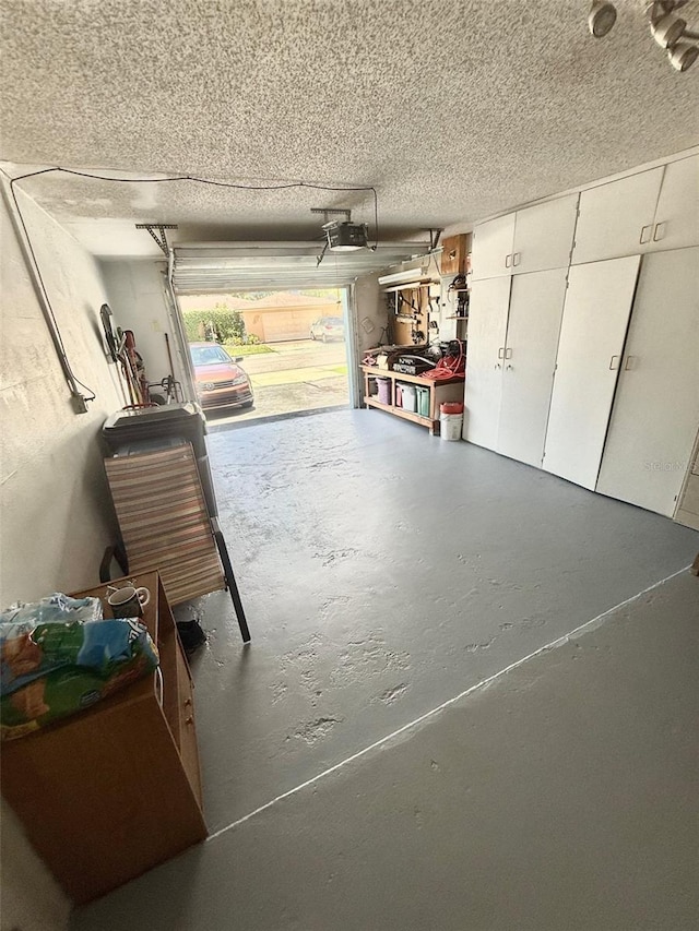 1814 Driftwood Cir S, Oldsmar, FL 34677 - garage featuring a garage door opener