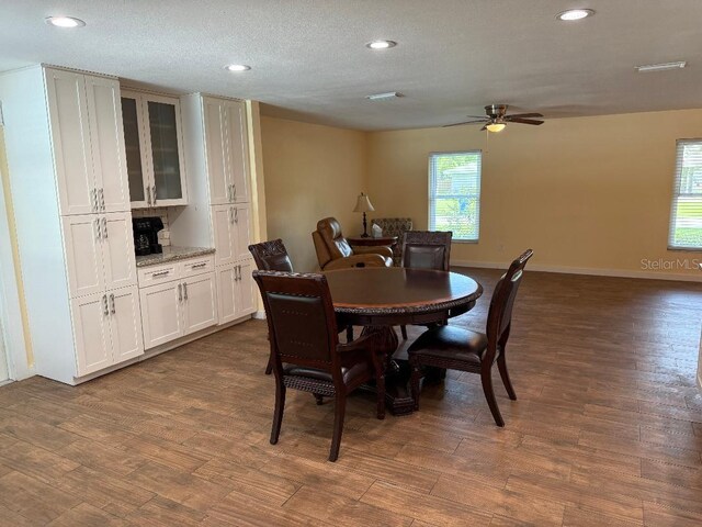 2005 Capri Rd, Valrico, FL 33594 - dining area with ceiling fan, wood finished floors, recessed lighting, and a textured ceiling