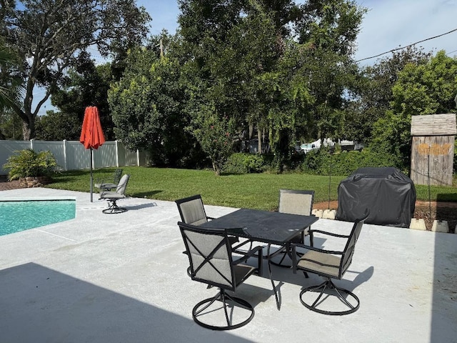 2005 Capri Rd, Valrico, FL 33594 - view of patio / terrace with a grill and outdoor dining area