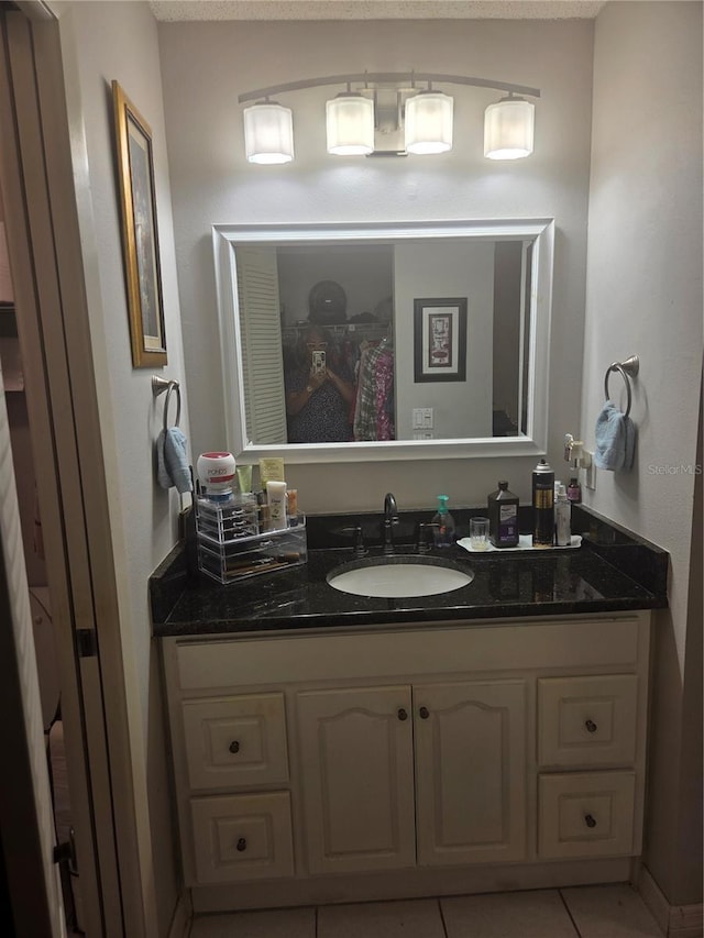 12133 Spartan Way Unit 203, Hudson, FL 34667 - bathroom featuring vanity and tile patterned flooring