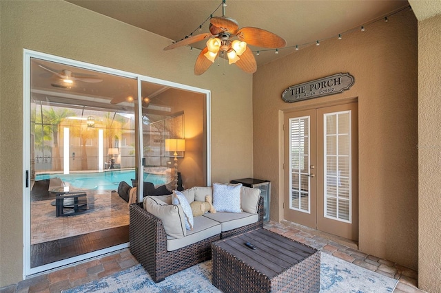 31646 Baymont Loop, Wesley Chapel, FL 33543 - sunroom / solarium with french doors, a ceiling fan, and an outdoor living space