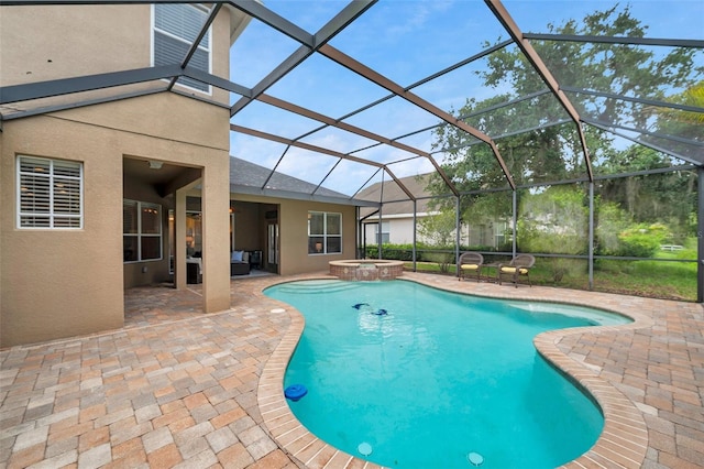 31646 Baymont Loop, Wesley Chapel, FL 33543 - view of swimming pool with a patio, a pool with connected hot tub, and a lanai