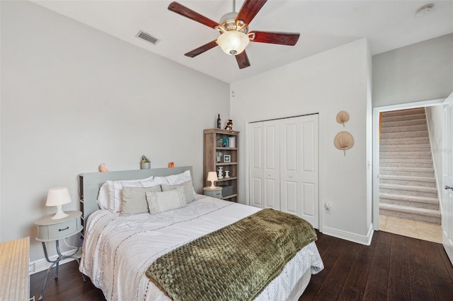 31646 Baymont Loop, Wesley Chapel, FL 33543 - bedroom with wood-type flooring, a closet, and ceiling fan