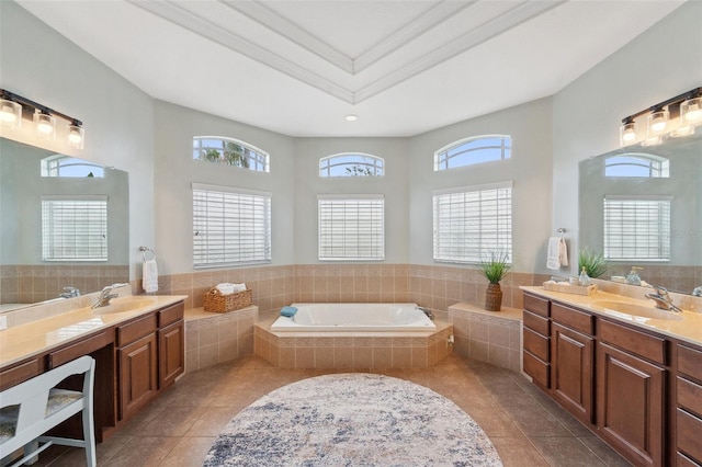 31646 Baymont Loop, Wesley Chapel, FL 33543 - bathroom with tile patterned flooring, a bath, two vanities, and crown molding