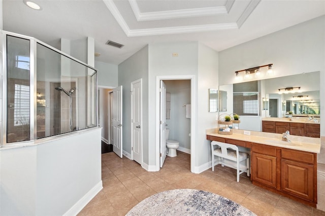 31646 Baymont Loop, Wesley Chapel, FL 33543 - full bath with a shower stall, vanity, a raised ceiling, ornamental molding, and tile patterned floors