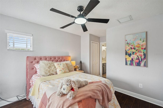 31646 Baymont Loop, Wesley Chapel, FL 33543 - bedroom with wood finished floors, a ceiling fan, a closet, and ensuite bath