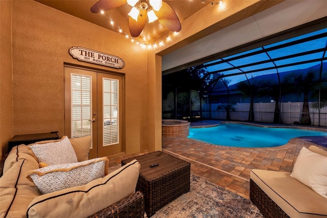 31646 Baymont Loop, Wesley Chapel, FL 33543 - view of swimming pool with french doors, an outdoor living space, a pool with connected hot tub, a patio area, and a ceiling fan