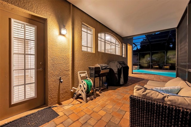 31646 Baymont Loop, Wesley Chapel, FL 33543 - view of patio featuring glass enclosure and a grill