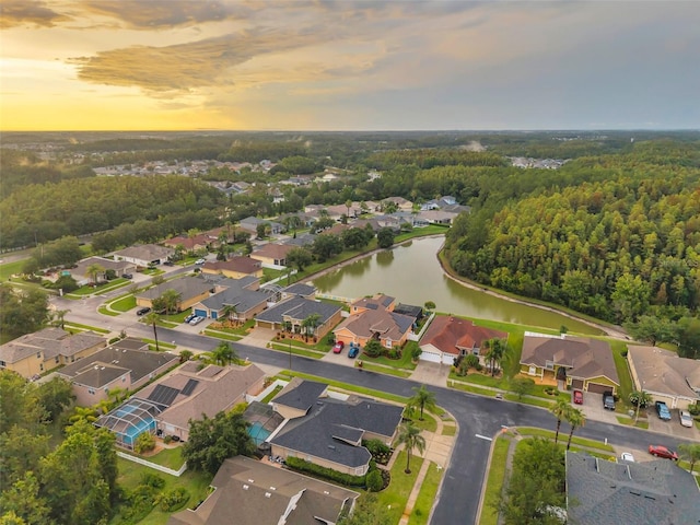 31646 Baymont Loop, Wesley Chapel, FL 33543 - aerial overview of property's location with a large body of water and nearby suburban area