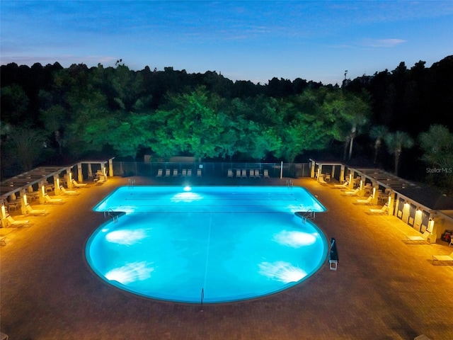 31646 Baymont Loop, Wesley Chapel, FL 33543 - community pool featuring a view of trees and a patio area