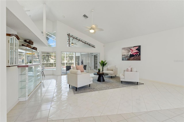 18561 Winding Oaks Blvd, Hudson, FL 34667 - living area with a ceiling fan and high vaulted ceiling