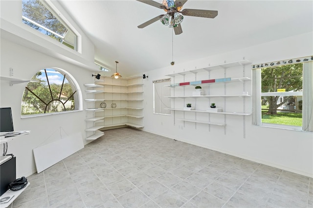 18561 Winding Oaks Blvd, Hudson, FL 34667 - spare room with lofted ceiling and ceiling fan