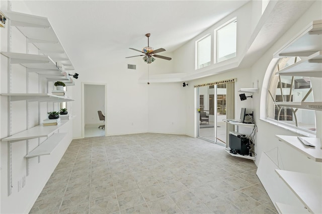 18561 Winding Oaks Blvd, Hudson, FL 34667 - unfurnished living room with a ceiling fan and lofted ceiling