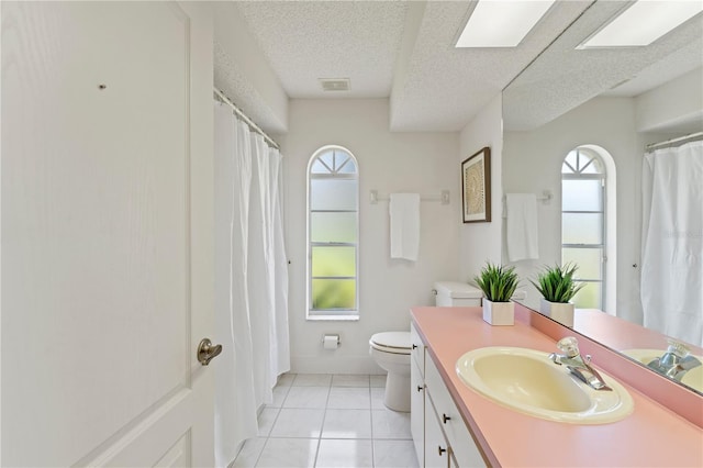 18561 Winding Oaks Blvd, Hudson, FL 34667 - bathroom featuring vanity, a textured ceiling, a shower with shower curtain, and marble look tile flooring