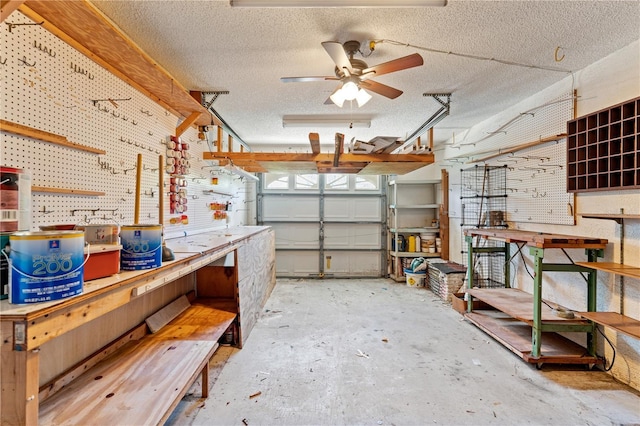 18561 Winding Oaks Blvd, Hudson, FL 34667 - garage with a workshop area and ceiling fan