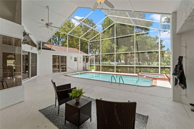 18561 Winding Oaks Blvd, Hudson, FL 34667 - view of swimming pool with a ceiling fan, a patio area, a lanai, and a pool with connected hot tub