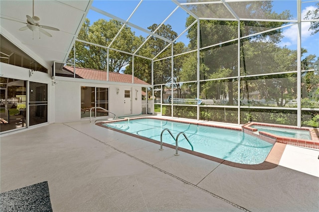 18561 Winding Oaks Blvd, Hudson, FL 34667 - view of pool featuring a patio area, a pool with connected hot tub, glass enclosure, and a ceiling fan