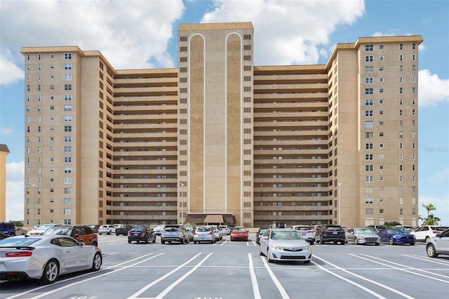 5200 Brittany Dr S Unit 1501, Saint Petersburg, FL 33715 - view of building exterior featuring uncovered parking