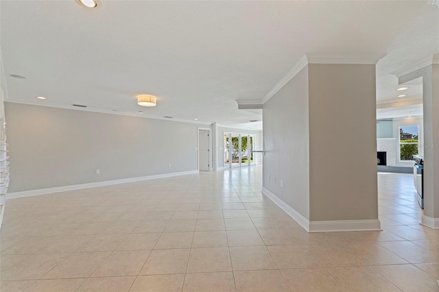 11225 4th St E, Treasure Island, FL 33706 - spare room featuring crown molding, light tile patterned floors, a fireplace, and recessed lighting