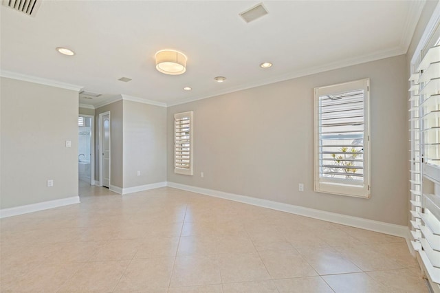 11225 4th St E, Treasure Island, FL 33706 - spare room featuring ornamental molding, recessed lighting, and light tile patterned flooring