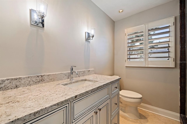 11225 4th St E, Treasure Island, FL 33706 - bathroom with tile patterned flooring, vanity, and recessed lighting
