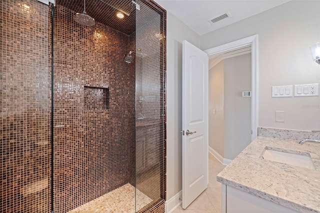 11225 4th St E, Treasure Island, FL 33706 - full bathroom featuring vanity, a stall shower, and tile patterned floors