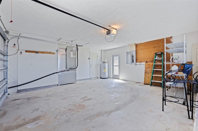 11225 4th St E, Treasure Island, FL 33706 - garage with a garage door opener, water heater, and electric panel
