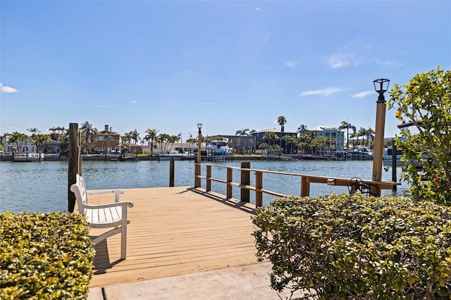 11225 4th St E, Treasure Island, FL 33706 - dock with a water view and a residential view