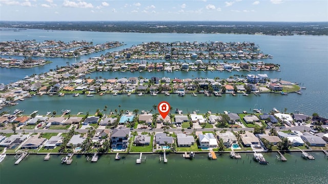 11225 4th St E, Treasure Island, FL 33706 - aerial view of property and surrounding area featuring nearby suburban area