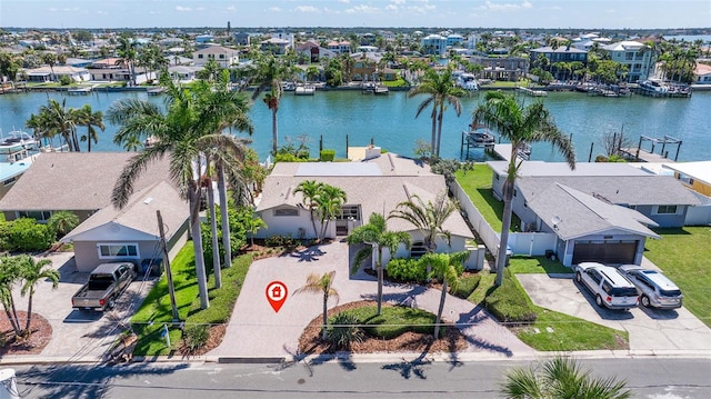 11225 4th St E, Treasure Island, FL 33706 - aerial perspective of suburban area featuring a nearby body of water