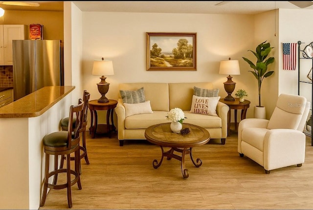5623 80th St N Unit 406, Saint Petersburg, FL 33709 - living room with light wood-style flooring