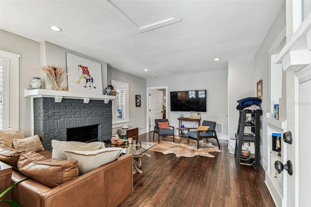 711 S Bungalow Ter, Tampa, FL 33606 - living area with a fireplace, hardwood / wood-style floors, and recessed lighting