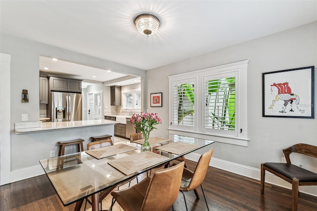 711 S Bungalow Ter, Tampa, FL 33606 - dining space featuring dark wood-type flooring and recessed lighting
