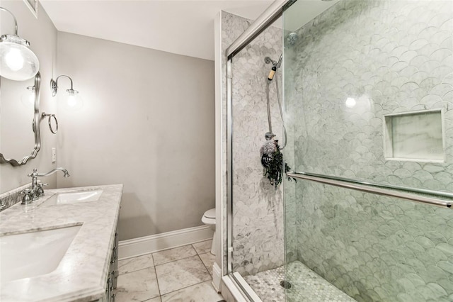 711 S Bungalow Ter, Tampa, FL 33606 - bathroom featuring a shower stall and double vanity