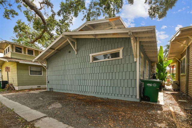 711 S Bungalow Ter, Tampa, FL 33606 - view of side of home featuring a cooling unit