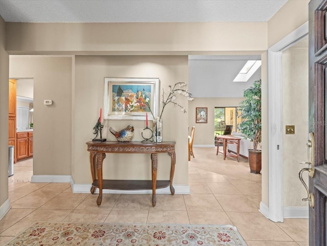 4209 Winding Willow Dr, Tampa, FL 33618 - entryway with light tile patterned flooring and a skylight