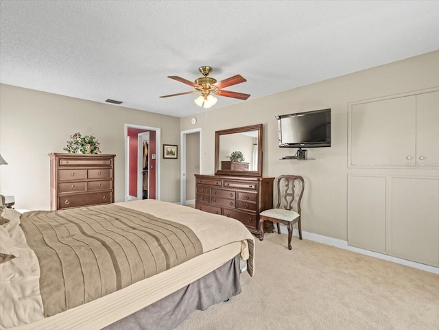 4209 Winding Willow Dr, Tampa, FL 33618 - bedroom with light carpet and ceiling fan