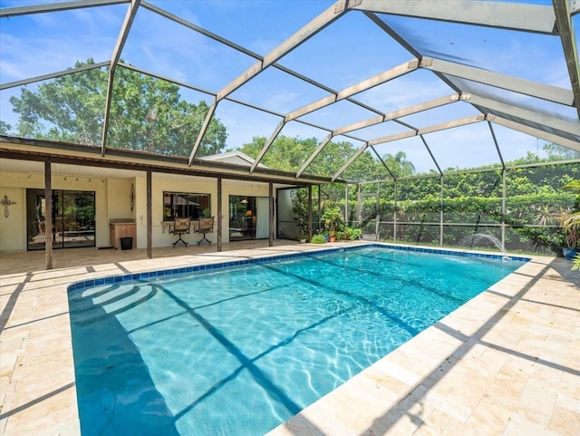 4209 Winding Willow Dr, Tampa, FL 33618 - outdoor pool featuring a patio and glass enclosure