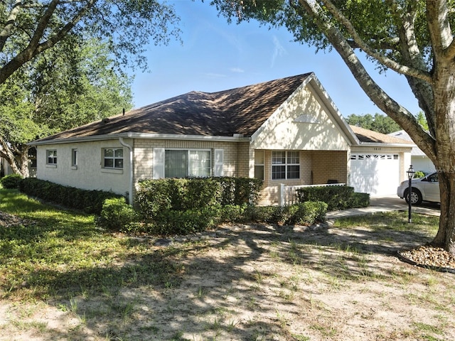 9859 SW 97th St, Ocala, FL 34481 - view of front facade with an attached garage and brick siding