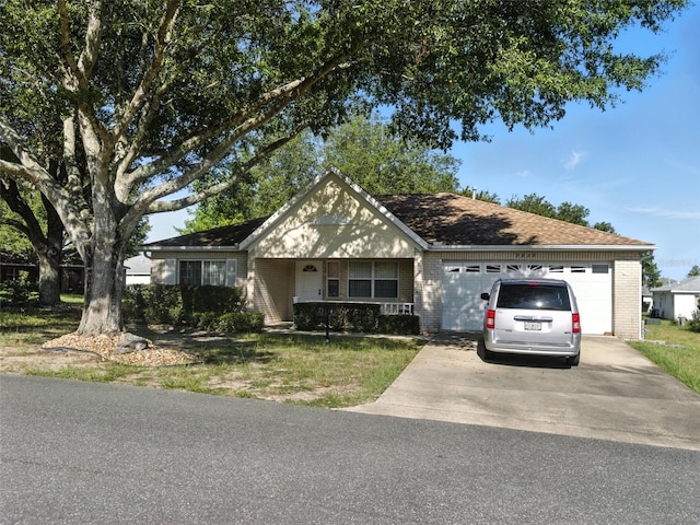 9859 SW 97th St, Ocala, FL 34481 - view of front of property with a garage, brick siding, driveway, and a porch