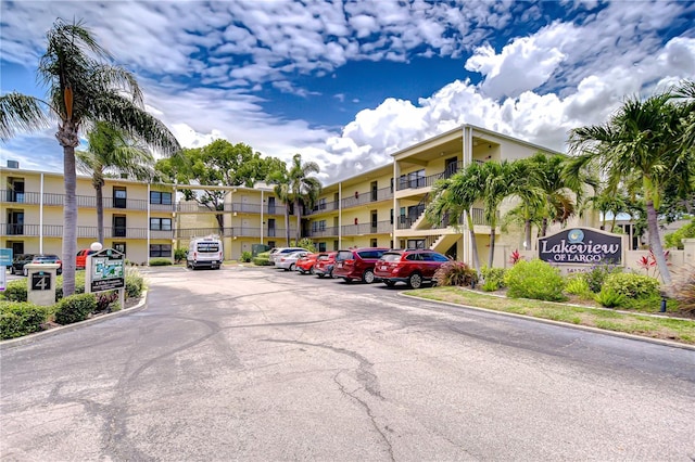 14130 Rosemary Ln Unit 4215, Largo, FL 33774 - view of apartment building / complex featuring uncovered parking