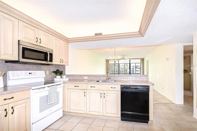 14130 Rosemary Ln Unit 4215, Largo, FL 33774 - kitchen featuring white electric range, stainless steel microwave, dishwasher, cream cabinets, and a textured ceiling