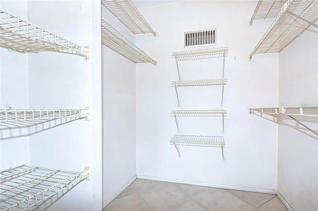14130 Rosemary Ln Unit 4215, Largo, FL 33774 - spacious closet featuring tile patterned flooring
