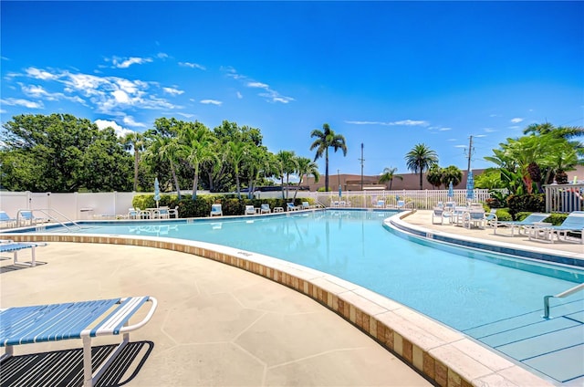 14130 Rosemary Ln Unit 4215, Largo, FL 33774 - community pool featuring a patio area