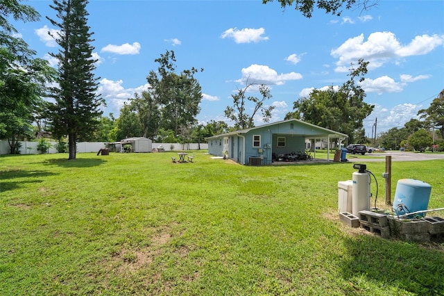 903 Dixie Maid Ln, Valrico, FL 33594 - fenced backyard with a storage unit
