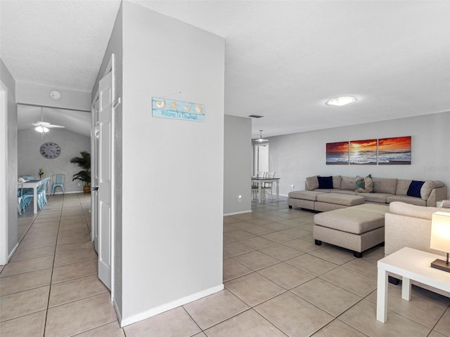 9109 134th Way, Seminole, FL 33776 - hallway with light tile patterned floors and baseboards