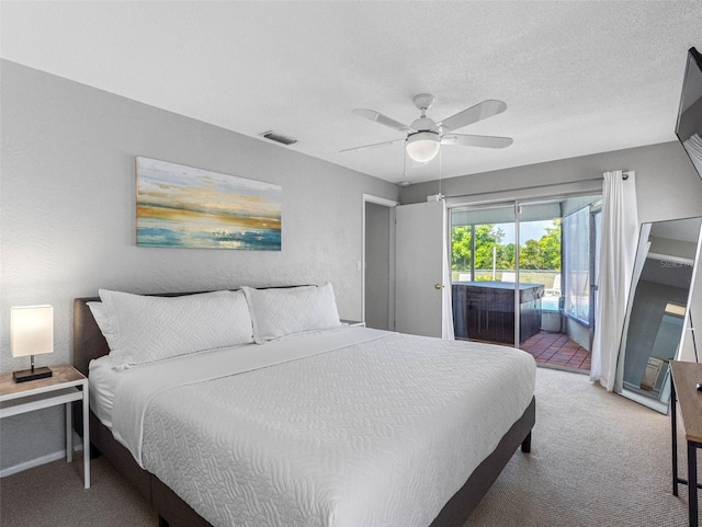 9109 134th Way, Seminole, FL 33776 - carpeted bedroom with access to outside and ceiling fan