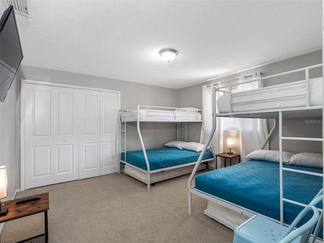 9109 134th Way, Seminole, FL 33776 - carpeted bedroom featuring a closet