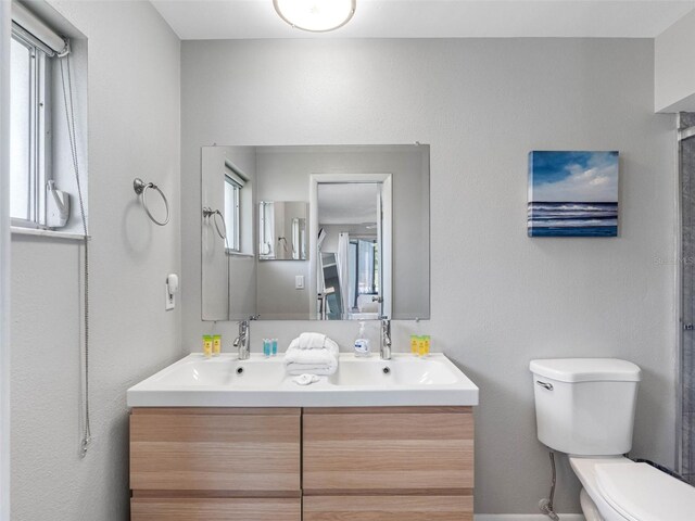 9109 134th Way, Seminole, FL 33776 - bathroom with toilet and double vanity
